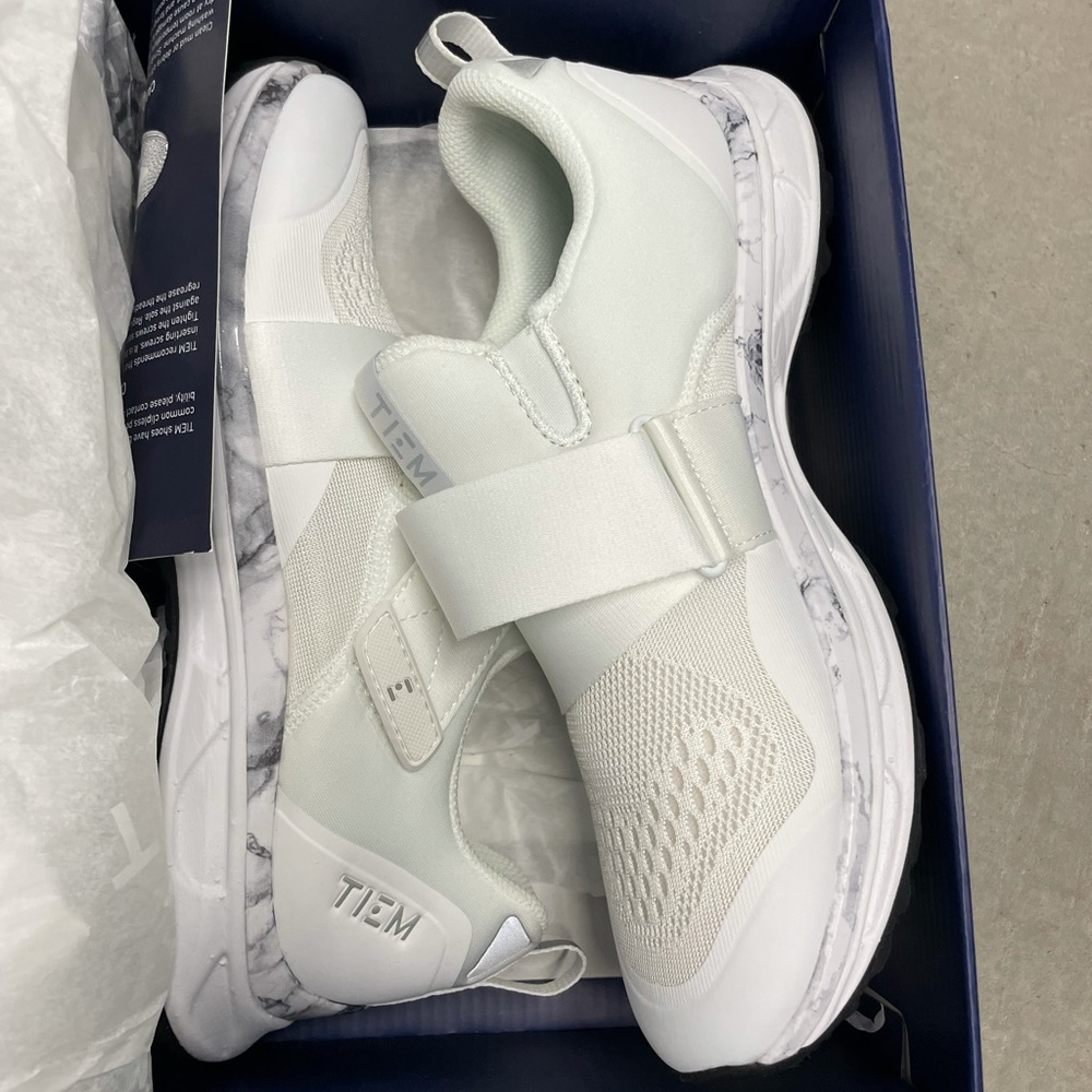 Never worn tiem spin shoes